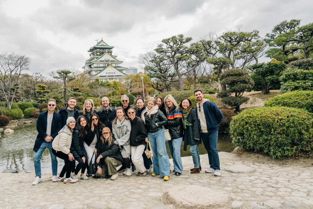 The SmartFlyer team posing in a Japanese garden